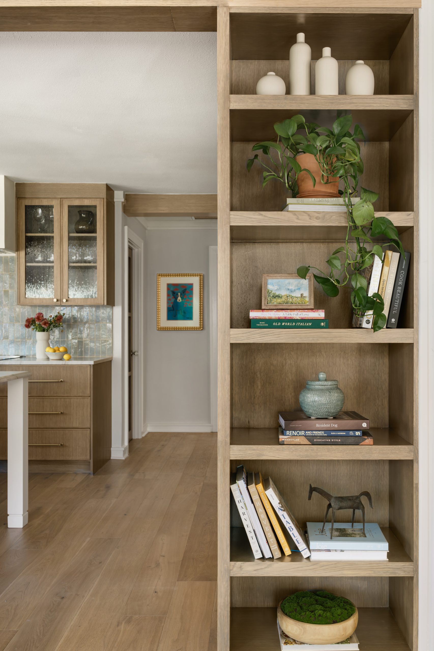 Open shelving and cane detailing in luxury kitchen renovation Austin