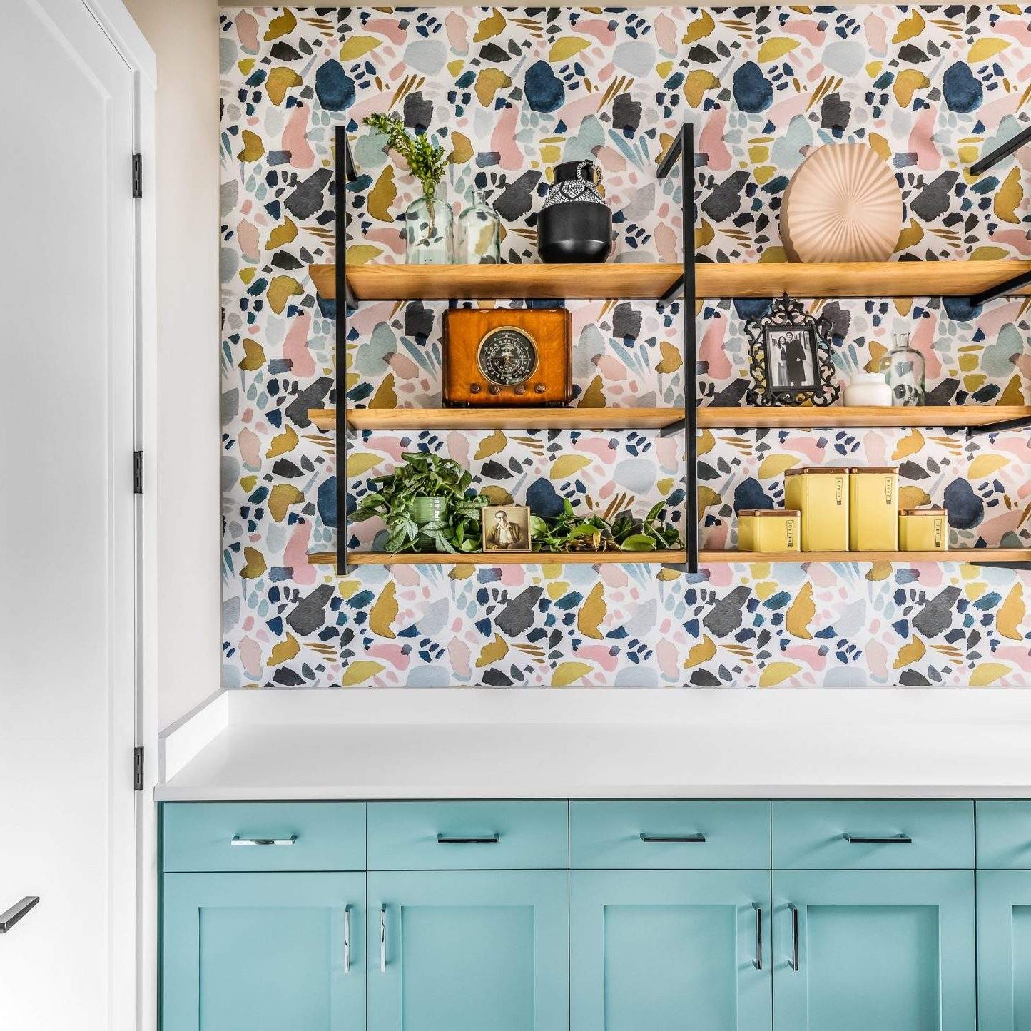 Etch Design Group in Austin, Texas - custom home designed to be comfortable and polished to make a bold statement - dramatic wallpaper selection in the laundry room.